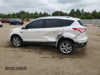 2014 Ford Escape Titanium с VIN 1FMCU0J93EUC35437, выставлен на аукционе Copart как лот 56299395 с пробегом 130 770 миль миль и Списание • Salvage title. История ставок и продаж доступна на DreamBid. Изображение 2.
