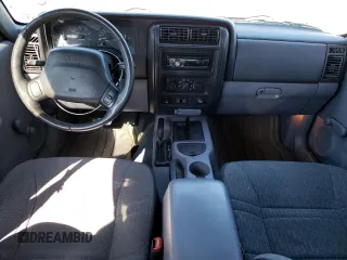 1997 Jeep Cherokee SE with VIN 1J4FJ28S4VL544977, listed as a Copart auction lot 70059214 with 271,174 mi miles and Salvage Title. Bid and sale history available at carsss.com. Image 8.