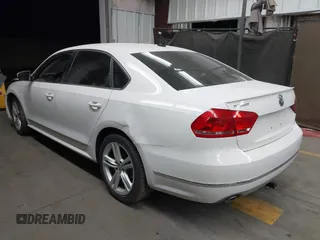 2013 Volkswagen Passat TDI SEL Premium with VIN 1VWCN7A39DC011421, listed as a IAAI auction lot 42042189 with 141,670 mi miles. Bid and sale history available at carsss.com. Image 3.