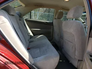 2004 Toyota Camry LE z VIN 4T1BE32K94U284667, wystawiony jako Copart lot #56184025 z przebiegiem 198 929 mil mil oraz Szkoda całkowita • Salvage title. Historia ofert i sprzedaży dostępna na DreamBid. Obrazek 10.