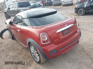 2015 MINI Coupe z VIN WMWSX1C54FT508123, wystawiony jako IAAI lot #40974103 z przebiegiem 79 035 mil mil oraz . Historia ofert i sprzedaży dostępna na DreamBid. Obrazek 3.