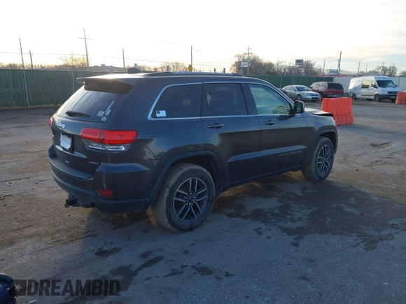 2019 Jeep Grand Cherokee Altitude with VIN 1C4RJEAG2KC698822, listed as a IAAI auction lot 41476562 with 128,035 mi miles and . Bid and sale history available at DreamBid. Image 4.