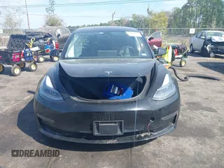 2023 Tesla Model 3 with VIN 5YJ3E1EA3PF681515, listed as a IAAI auction lot 41899053 with 15,985 mi miles and . Bid and sale history available at carsss.com. Image 12.