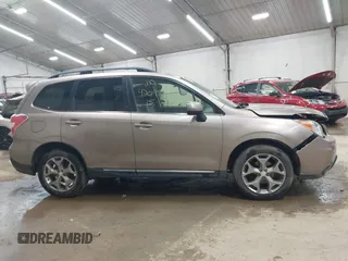 2015 Subaru Forester Touring with VIN JF2SJAUC6FH455446, listed as a IAAI auction lot 42095963 with 152,545 mi miles and . Bid and sale history available at DreamBid. Image 13.