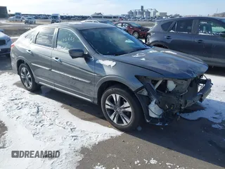 2014 Honda Crosstour EX-L z VIN 5J6TF2H58EL004207, wystawiony jako IAAI lot #41076263 z przebiegiem 122 742 mil mil oraz . Historia ofert i sprzedaży dostępna na DreamBid. Obrazek 1.
