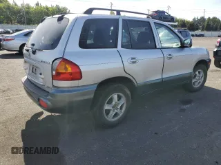 2001 Hyundai Santa Fe GLS with VIN KM8SC83D71U011483, listed as a Copart auction lot 72519174 with 138,901 mi miles and Salvage Title. Bid and sale history available at carsss.com. Image 3.