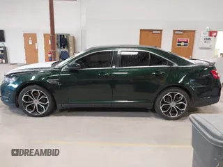 2013 Ford Taurus SHO z VIN 1FAHP2KT8DG142620, wystawiony jako IAAI lot #41800583 z przebiegiem 175 812 mil mil oraz . Historia ofert i sprzedaży dostępna na DreamBid. Obrazek 15.