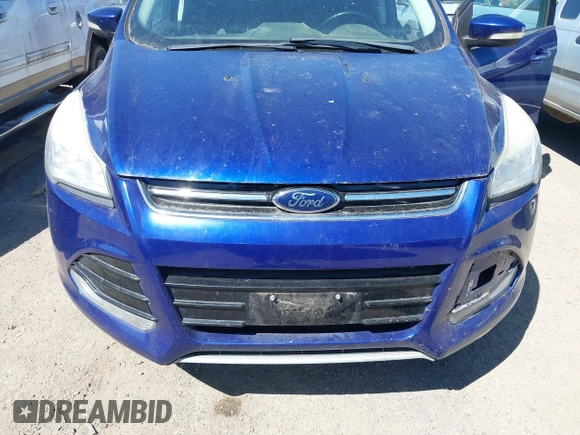 2013 Ford Escape SEL with VIN 1FMCU9HX3DUB97778, listed as a IAAI auction lot 42195445 with 147,154 mi miles. Bid and sale history available at carsss.com. Image 6.