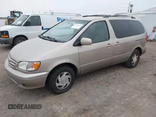 2002 Toyota Sienna LE with VIN 4T3ZF13C42U418853, listed as a IAAI auction lot 41248253 with 193,986 mi miles. Bid and sale history available at carsss.com. Image 2.