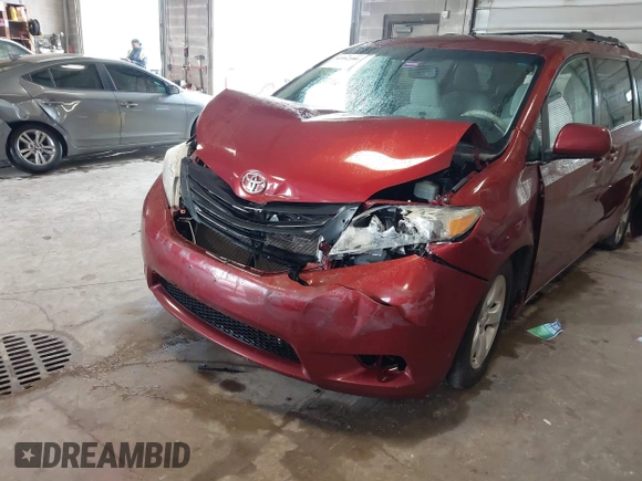 2012 Toyota Sienna LE AAS with VIN 5TDKK3DC5CS277303, listed as a IAAI auction lot 42162586 with 128,656 mi miles and . Bid and sale history available at DreamBid. Image 6.