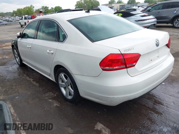 2013 Volkswagen Passat SE with VIN 1VWBH7A36DC110720, listed as a IAAI auction lot 41997869 with 114,246 mi miles and . Bid and sale history available at DreamBid. Image 3.