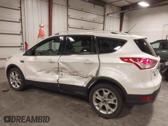 2016 Ford Escape Titanium with VIN 1FMCU9J99GUA61848, listed as a IAAI auction lot 42300324 with 51,692 mi miles and . Bid and sale history available at DreamBid. Image 14.