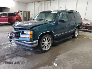 1998 GMC Yukon with VIN 1GKEC13RXWJ731667, listed as a Copart auction lot 78848954 with 202,164 mi miles and Salvage Title. Bid and sale history available at carsss.com. Image 1.
