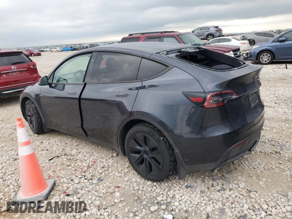 2024 Tesla Model Y with VIN 7SAYGDEDXRA322676, listed as a Copart auction lot 55664125 with 8,788 mi miles and Clean title. Bid and sale history available at DreamBid. Image 2.