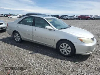 2004 Toyota Camry LE with VIN 4T1BF30K84U588220, listed as a Copart auction lot 54441185 with 165,890 mi miles and Non Repairable. Bid and sale history available at carsss.com. Image 4.