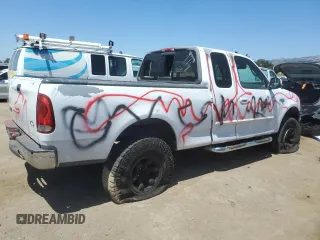 1999 Ford F-150 with VIN 1FTZX1727XKA70271, listed as a Copart auction lot 58016095 with 219,093 mi miles and Salvage title. Bid and sale history available at DreamBid. Image 3.