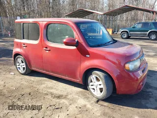 2013 Nissan Cube SL z VIN JN8AZ2KR2DT301203, wystawiony jako IAAI lot #41637954 z przebiegiem 80 603 mil mil oraz . Historia ofert i sprzedaży dostępna na DreamBid. Obrazek 1.