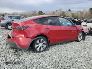 2022 Tesla Model Y Long Range z VIN 7SAYGDEE5NF387781, wystawiony jako Copart lot #50248215 z przebiegiem 24 173 mil mil oraz Szkoda całkowita • Salvage title. Historia ofert i sprzedaży dostępna na DreamBid. Obrazek 3.