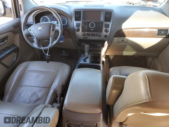 2015 Nissan Armada Platinum z VIN 5N1BA0NF2FN602165, wystawiony jako Copart lot #81283414 z przebiegiem Nie podano mil oraz Szkoda całkowita • Salvage title. Historia ofert i sprzedaży dostępna na DreamBid. Obrazek 8.