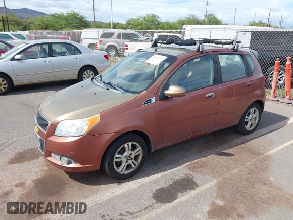 2011 Chevrolet Aveo 2LT with VIN KL1TG6DE9BB256444, listed as a IAAI auction lot 42576944 with 100,501 mi miles and . Bid and sale history available at DreamBid. Image 2.