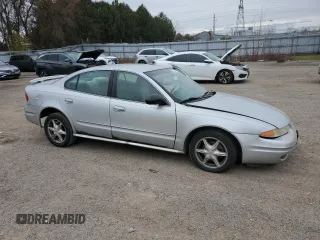 2004 Oldsmobile Alero GL1 z VIN 1G3NL52E54C192426, wystawiony jako Copart lot #80361784 z przebiegiem 251 493 mil mil oraz Szkoda całkowita • Salvage title. Historia ofert i sprzedaży dostępna na DreamBid. Obrazek 4.