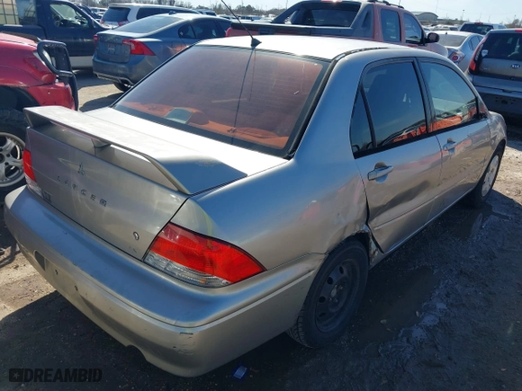 2002 Mitsubishi Lancer ES with VIN JA3AJ26E82U076009, listed as a IAAI auction lot 41671572 with 172,236 mi miles. Bid and sale history available at carsss.com. Image 4.