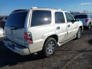 2004 Cadillac Escalade with VIN 1GYEC63T64R270674, listed as a IAAI auction lot 41316835 with 228,808 mi miles and . Bid and sale history available at DreamBid. Image 4.