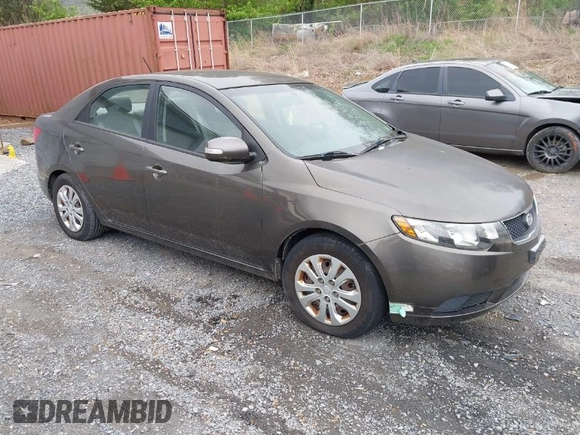 2010 Kia Forte EX with VIN KNAFU4A23A5847814, listed as a IAAI auction lot 42048432 with 97,678 mi miles. Bid and sale history available at carsss.com. Image 1.