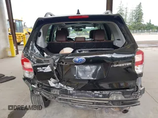 2018 Subaru Forester Touring with VIN JF2SJAWC2JH598982, listed as a IAAI auction lot 42455652 with 57,254 mi miles and . Bid and sale history available at DreamBid. Image 17.