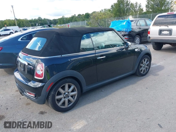 2012 MINI Convertible S z VIN WMWZP3C56CT250533, wystawiony jako IAAI lot #41506301 z przebiegiem 89 854 mil mil oraz . Historia ofert i sprzedaży dostępna na DreamBid. Obrazek 4.