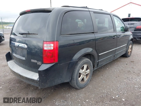 2009 Dodge Grand Caravan SXT z VIN 2D8HN54109R596185, wystawiony jako IAAI lot #42382133 z przebiegiem 207 882 mil mil oraz . Historia ofert i sprzedaży dostępna na DreamBid. Obrazek 4.