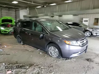 2015 Honda Odyssey LX с VIN 5FNRL5H25FB123692, выставлен на аукционе Copart как лот 57319855 с пробегом Не указан миль и На запчасти • Non repairable. История ставок и продаж доступна на DreamBid. Изображение 15.