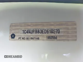 2014 Jeep Patriot Sport with VIN 1C4NJPBB3ED618570, listed as a IAAI auction lot 42126639 with 157,005 mi miles and . Bid and sale history available at DreamBid. Image 9.