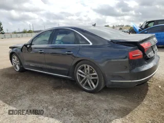 2015 Audi A8 4.0T with VIN WAUJ2AFD5FN013267, listed as a Copart auction lot 39065654 with 64,541 mi miles and . Bid and sale history available at DreamBid. Image 2.