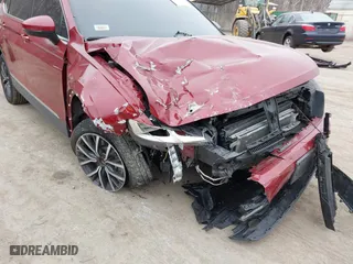 2020 Volkswagen Tiguan SE with VIN 3VV2B7AX2LM018722, listed as a IAAI auction lot 41802291 with 58,914 mi miles. Bid and sale history available at carsss.com. Image 6.