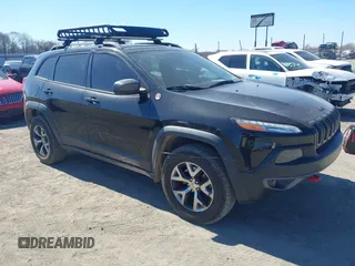 2015 Jeep Cherokee Trailhawk with VIN 1C4PJMBS5FW577470, listed as a IAAI auction lot 41565837 with 191,105 mi miles. Bid and sale history available at carsss.com. Image 13.