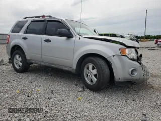 2009 Ford Escape XLS z VIN 1FMCU92789KB10338, wystawiony jako Copart lot #57452495 z przebiegiem 285 171 mil mil oraz Szkoda całkowita • Salvage title. Historia ofert i sprzedaży dostępna na DreamBid. Obrazek 4.