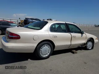 1995 Lincoln Continental z VIN 1LNLM97V3SY641554, wystawiony jako Copart lot #55001165 z przebiegiem 173 490 mil mil oraz Szkody całkowita. Historia ofert i sprzedaży dostępna na DreamBid. Obrazek 3.