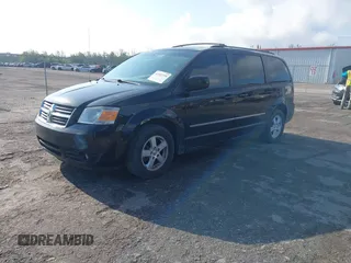 2010 Dodge Grand Caravan SXT with VIN 2D4RN5D17AR256493, listed as a IAAI auction lot 42187799 with 248,421 mi miles and . Bid and sale history available at DreamBid. Image 2.