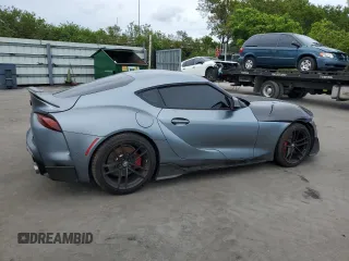 2022 Toyota Supra 3.0 with VIN WZ1DB0C09NW047931, listed as a Copart auction lot 59527955 with 61,941 mi miles and Salvage title. Bid and sale history available at DreamBid. Image 3.