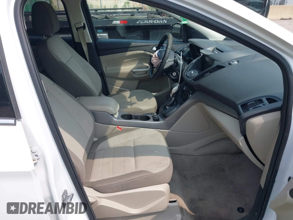 2014 Ford Escape SE with VIN 1FMCU9G99EUC81141, listed as a IAAI auction lot 42436279 with 123,947 mi miles and . Bid and sale history available at DreamBid. Image 5.