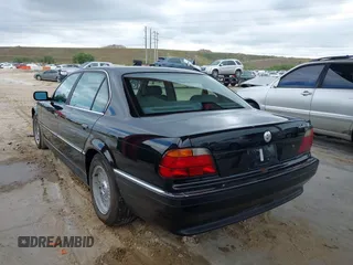 1997 BMW 7 Series 740il with VIN WBAGJ8324VDL43320, listed as a IAAI auction lot 41990660 with 193,998 mi miles. Bid and sale history available at carsss.com. Image 3.