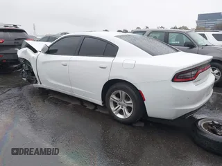 2021 Dodge Charger SXT with VIN 2C3CDXBGXMH514870, listed as a IAAI auction lot 41725294 with 72,962 mi miles. Bid and sale history available at carsss.com. Image 3.