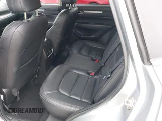 2023 Mazda CX-5 S Carbon Edition z VIN JM3KFBCM3P0197796, wystawiony jako IAAI lot #42408301 z przebiegiem 46 169 mil mil oraz . Historia ofert i sprzedaży dostępna na DreamBid. Obrazek 8.