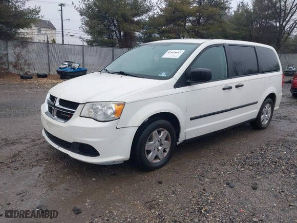 2012 Dodge Grand Caravan SE with VIN 2C4RDGBG6CR399702, listed as a IAAI auction lot 41458861 with 172,349 mi miles. Bid and sale history available at carsss.com. Image 2.