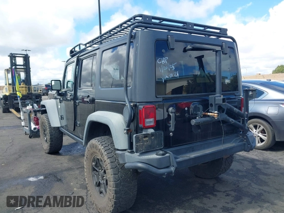 2014 Jeep Wrangler Unlimited Rubicon with VIN 1C4BJWFGXEL172622, listed as a IAAI auction lot 41782796 with 67,594 mi miles. Bid and sale history available at carsss.com. Image 15.