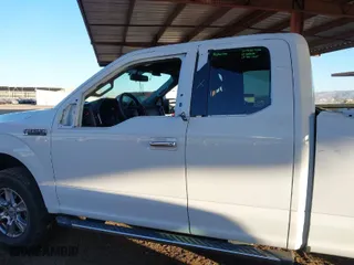 2015 Ford F-150 XLT with VIN 1FTEX1E87FFD13249, listed as a IAAI auction lot 41214373 with 66,076 mi miles. Bid and sale history available at carsss.com. Image 14.