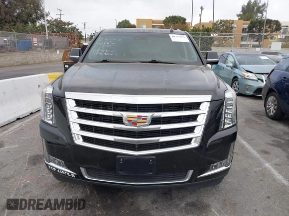 2020 Cadillac Escalade ESV Luxury z VIN 1GYS4HKJ7LR116999, wystawiony jako IAAI lot #40707280 z przebiegiem 117 358 mil mil oraz . Historia ofert i sprzedaży dostępna na DreamBid. Obrazek 13.