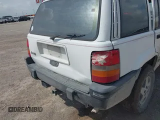 1994 Jeep Grand Cherokee Laredo with VIN 1J4FX58SXRC120936, listed as a IAAI auction lot 42530212 with 126,367 mi miles and . Bid and sale history available at DreamBid. Image 12.