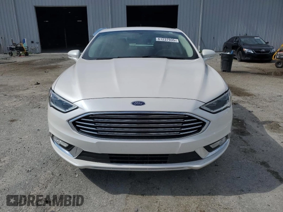 2017 Ford Fusion Titanium с VIN 3FA6P0K96HR161679, выставлен на аукционе Copart как лот 61237935 с пробегом 66 680 миль миль и Списание • Salvage title. История ставок и продаж доступна на DreamBid. Изображение 5.